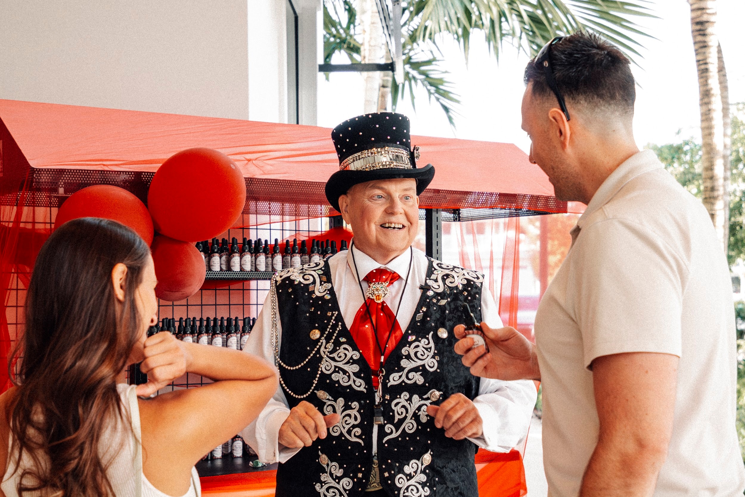 Ringmaster entertaining visitors at circus tent